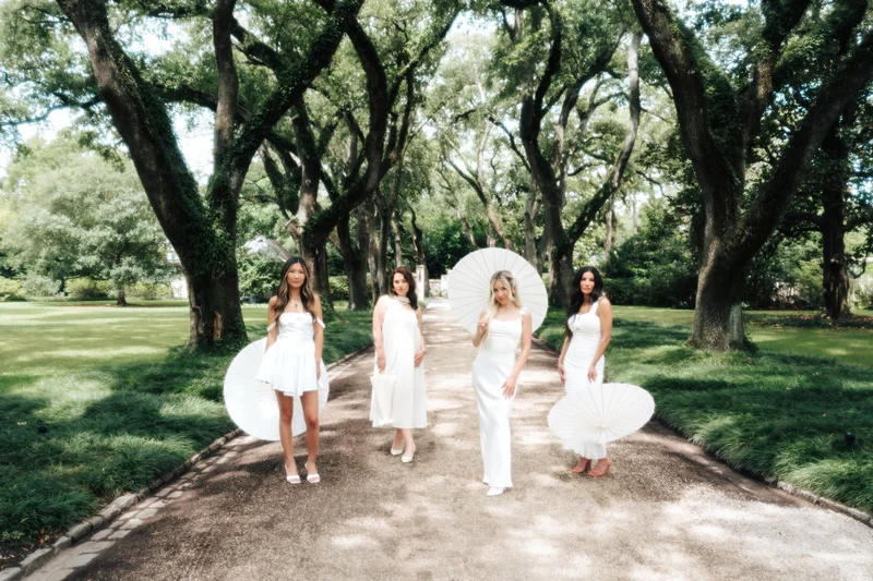 The Beauty Society by Gina collective in elegant black and white attire